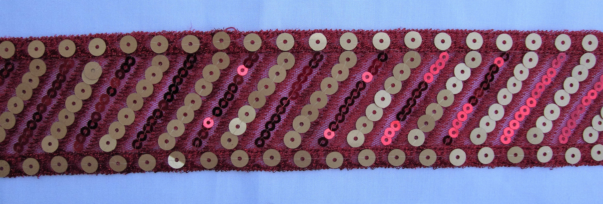 Red Mesh Trimming with Sequins (Sold as a 3 yard piece)
